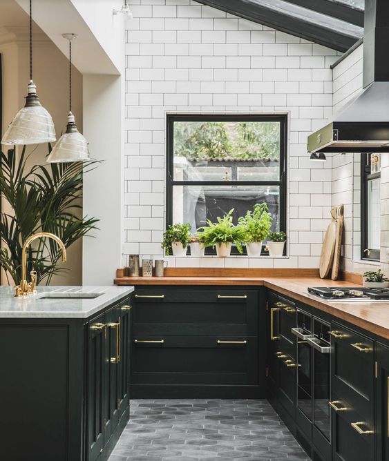 Black cabinets with butcher block counter tops