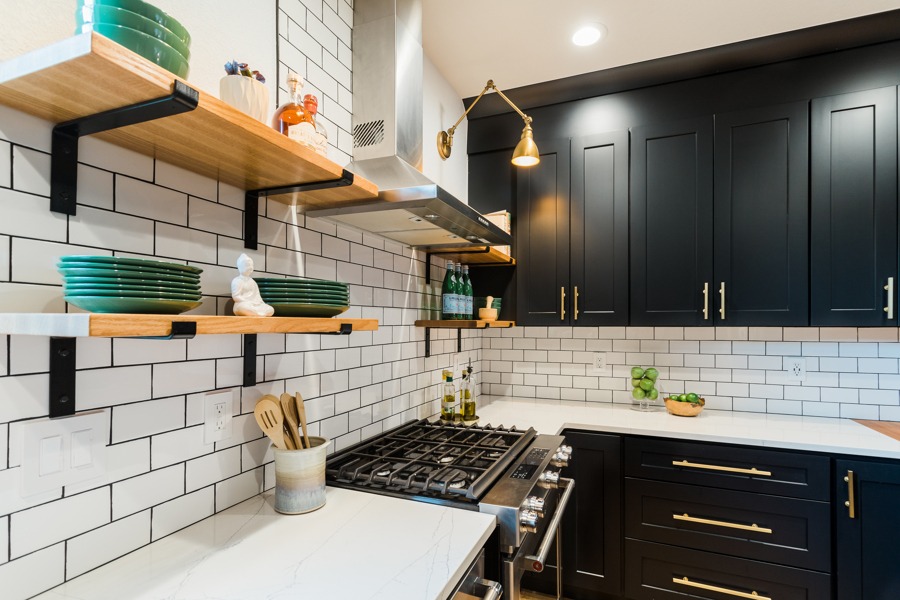 White counter and black cabinets