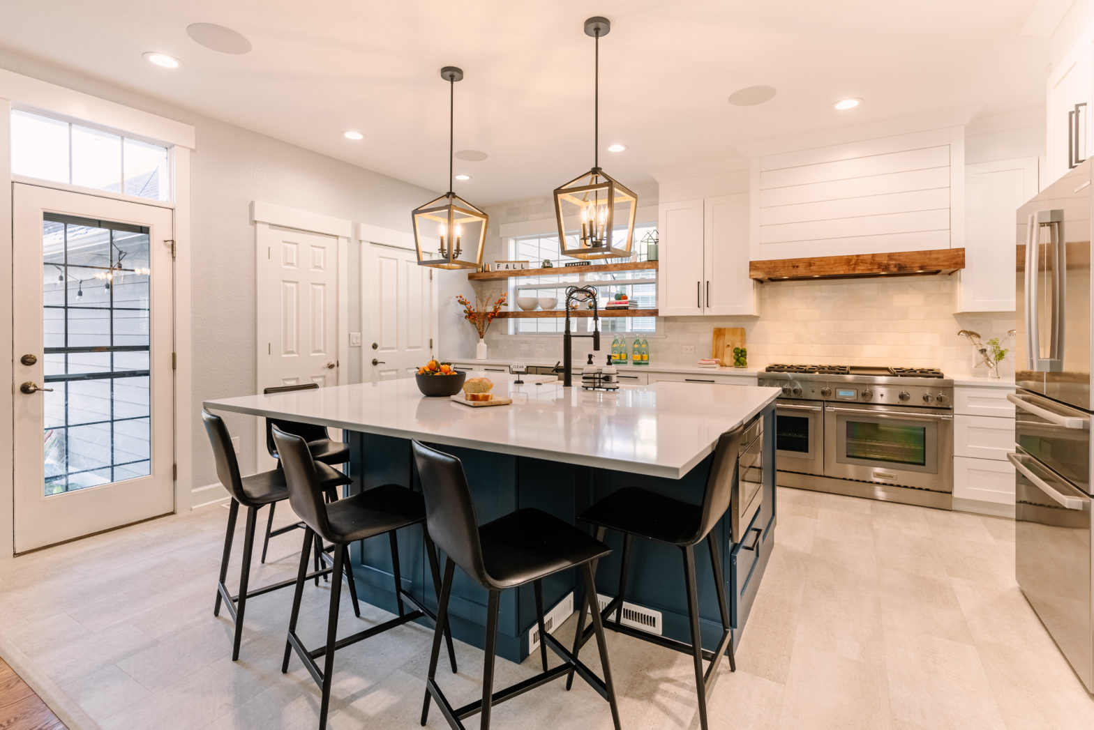 wide shot of a kitchen with a center island