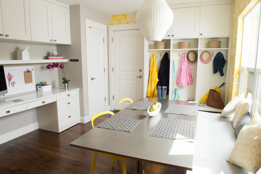 small study and office nook in house with coat hooks and storage